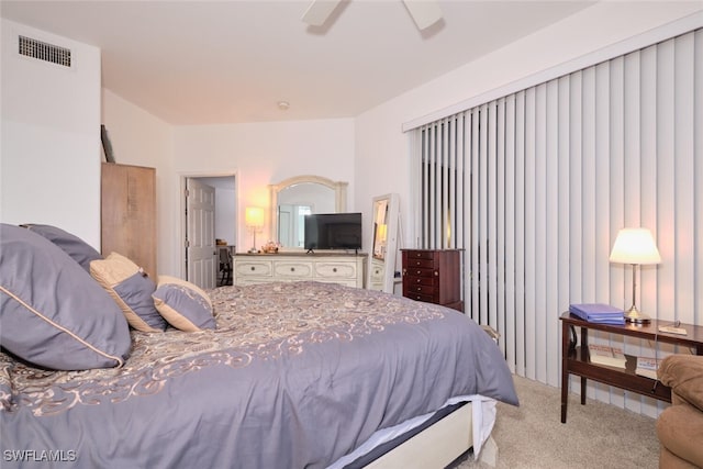 carpeted bedroom featuring ceiling fan