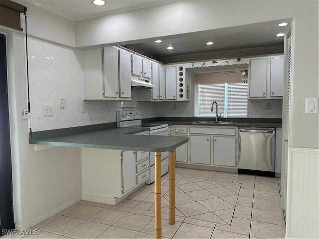 kitchen with white electric range, under cabinet range hood, a sink, stainless steel dishwasher, and dark countertops