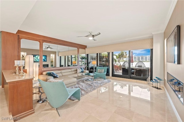 living room featuring ceiling fan and crown molding