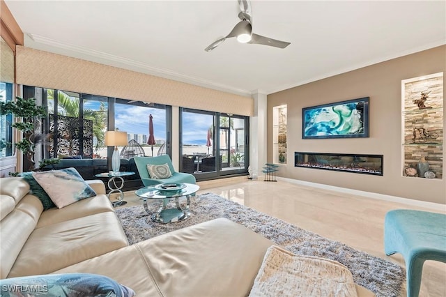 living room featuring ceiling fan and crown molding