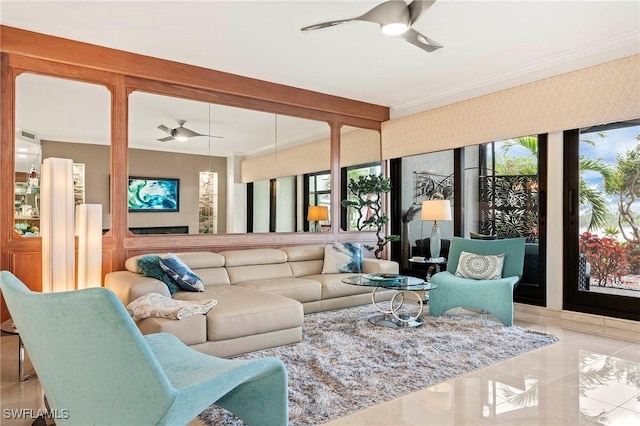 sunroom featuring ceiling fan