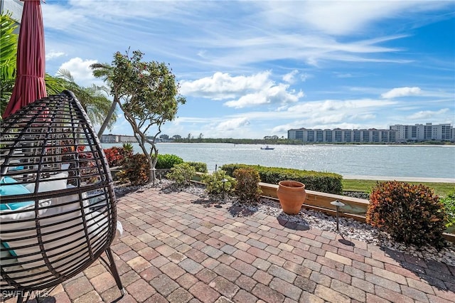 view of patio / terrace featuring a water view