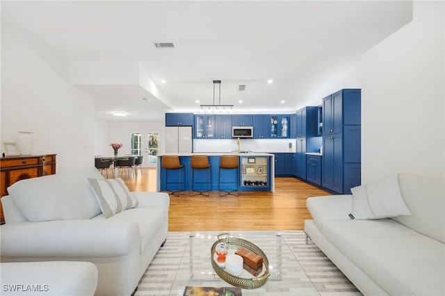 living room featuring light hardwood / wood-style floors