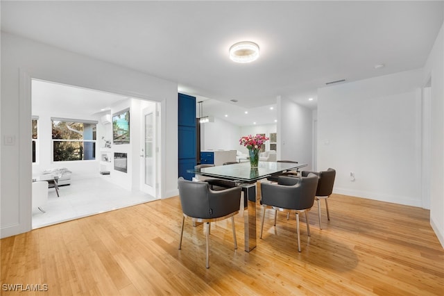 dining room featuring light hardwood / wood-style flooring