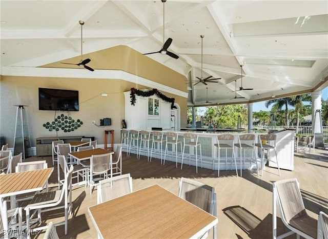 view of patio / terrace with outdoor dining space and a ceiling fan