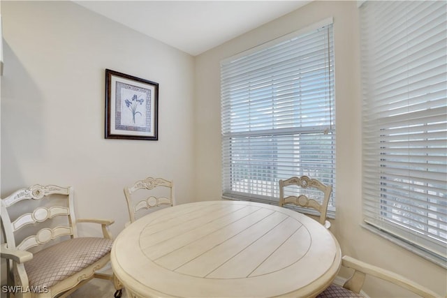 dining room with baseboards