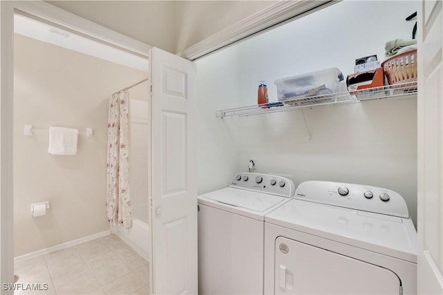 laundry area featuring washer and clothes dryer