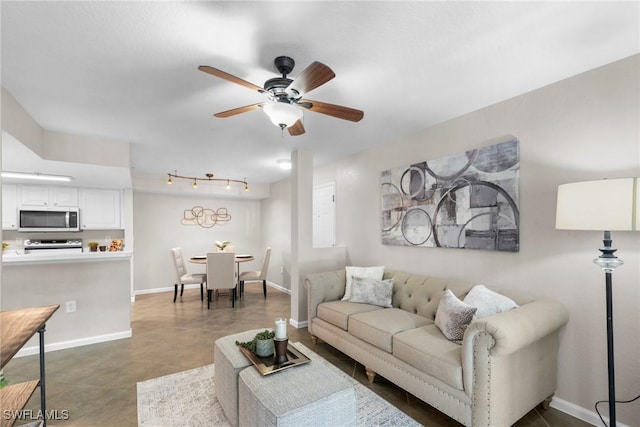 living room featuring ceiling fan