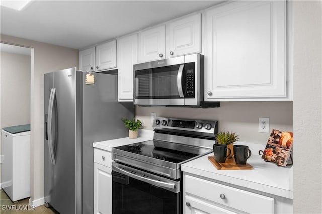 kitchen featuring white cabinets and stainless steel appliances