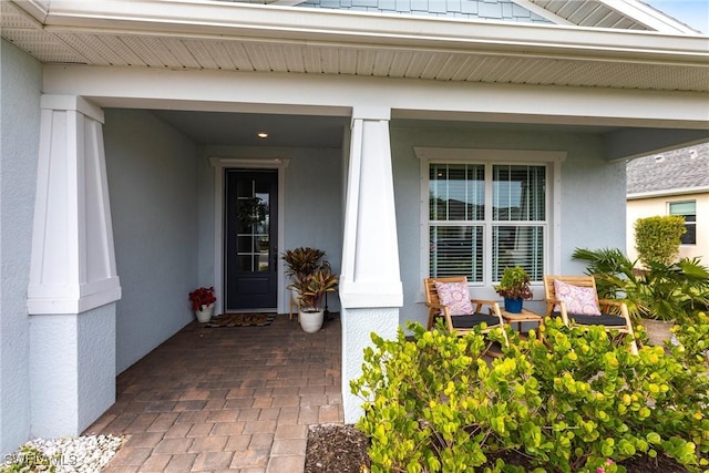 property entrance with a porch