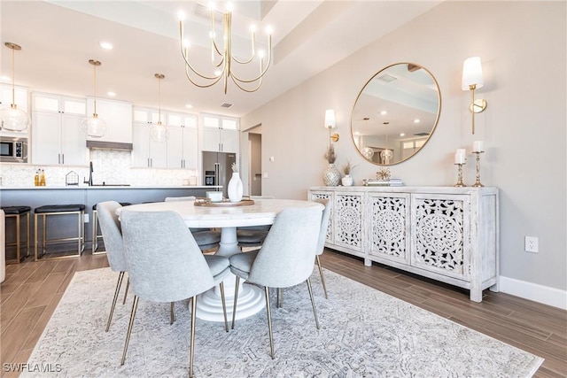 dining area featuring sink