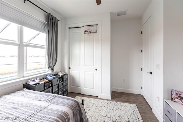 bedroom featuring a closet and ceiling fan