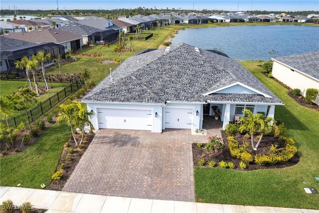 drone / aerial view with a water view