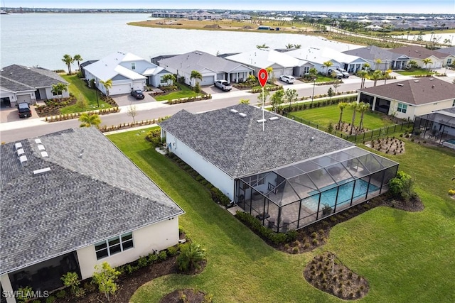 aerial view featuring a water view