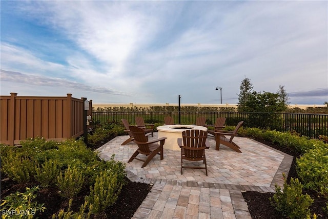 view of patio / terrace with a fire pit