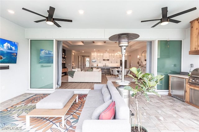 living room featuring ceiling fan