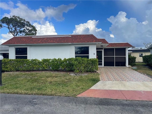 view of front of home with a front yard