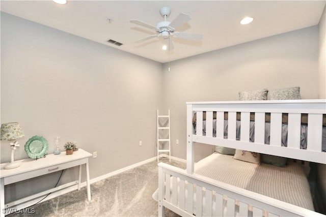 bedroom featuring light carpet and ceiling fan