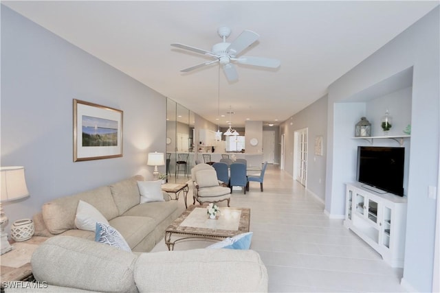 living room with ceiling fan