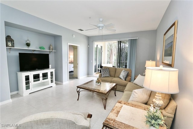 living room with ceiling fan