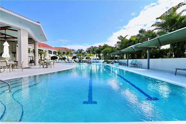 view of swimming pool featuring a patio area