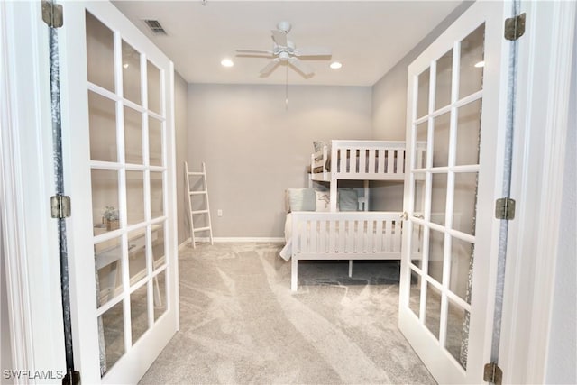 bedroom featuring visible vents, baseboards, carpet flooring, recessed lighting, and french doors