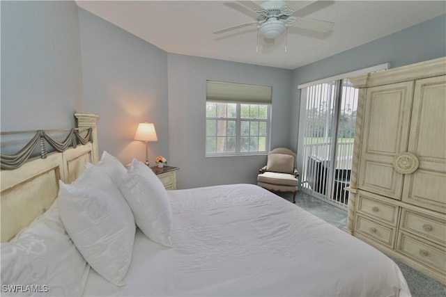 bedroom with access to exterior and ceiling fan