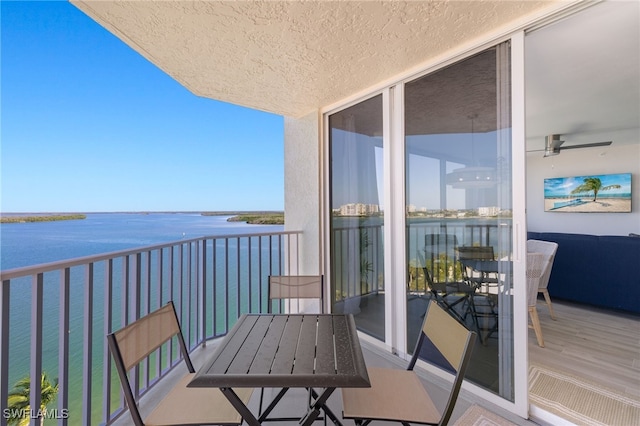 balcony featuring a water view