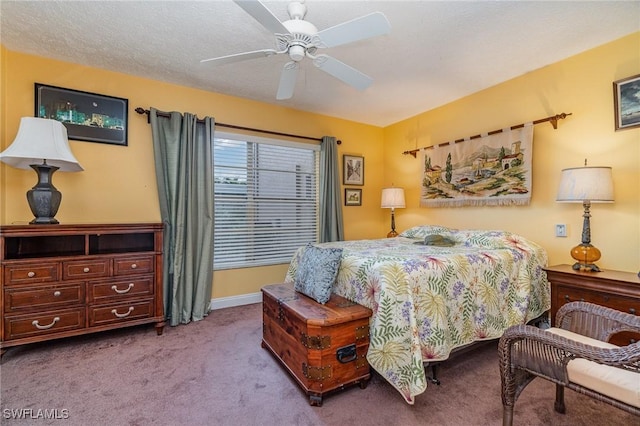 806 SE 46th St Unit 1E, Cape Coral, FL 33904 - carpeted bedroom with ceiling fan and a textured ceiling