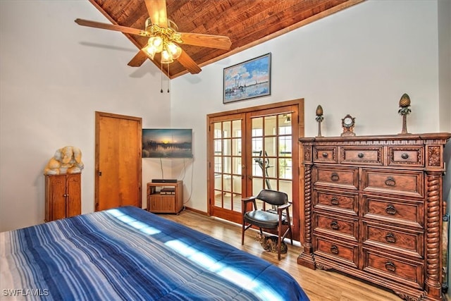 bedroom with ceiling fan, french doors, high vaulted ceiling, light hardwood / wood-style floors, and wood ceiling