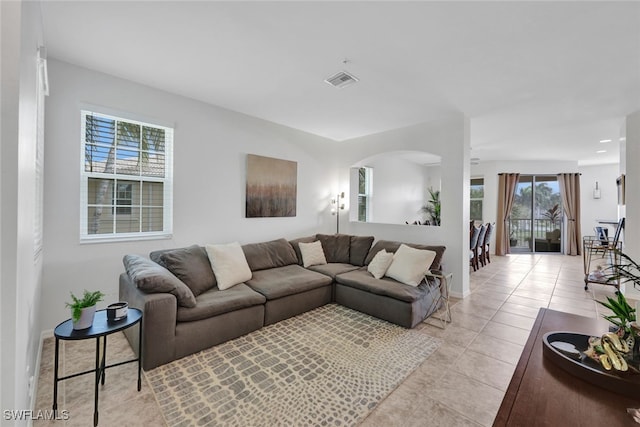 living room with light tile patterned flooring