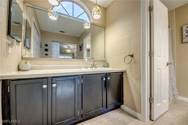 bathroom with vanity and tile patterned floors