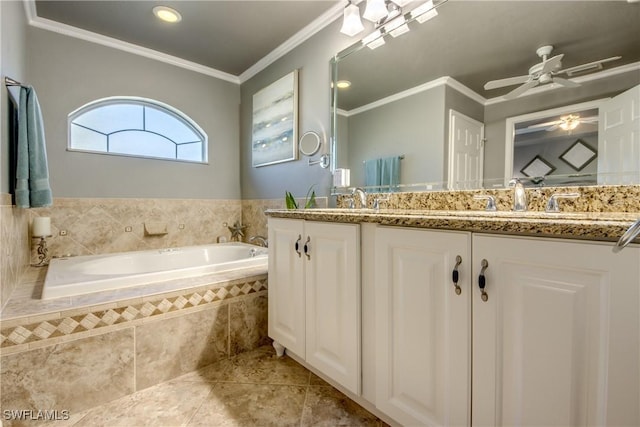 bathroom featuring ceiling fan, tile patterned flooring, tiled bath, crown molding, and vanity