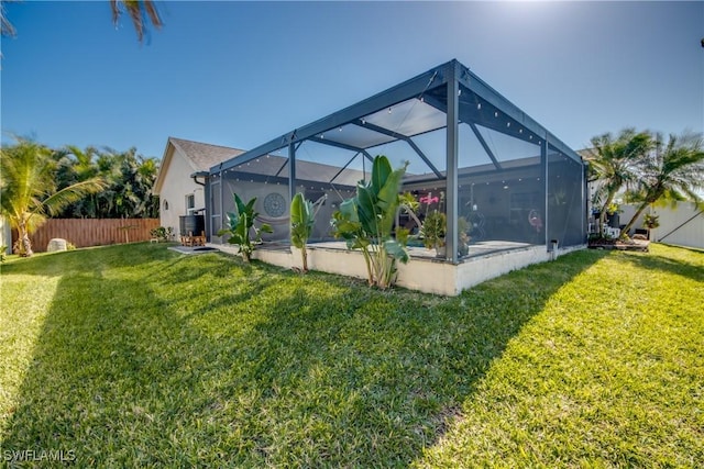 view of yard featuring a lanai and cooling unit