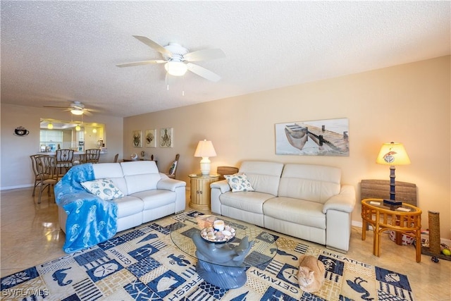 tiled living room with a textured ceiling