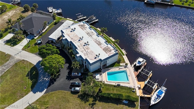 birds eye view of property featuring a water view