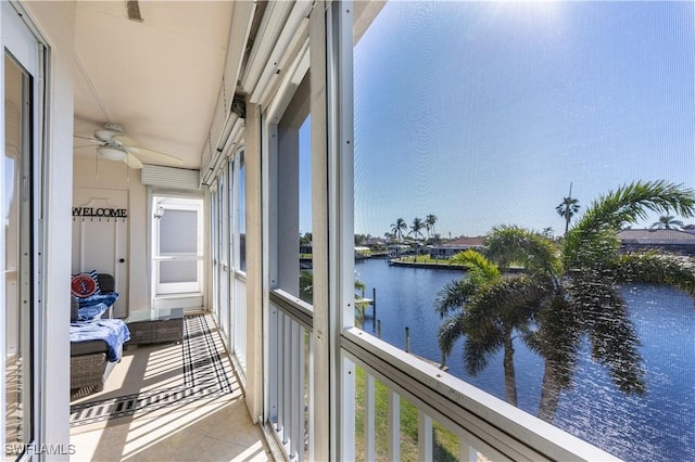 balcony featuring a water view