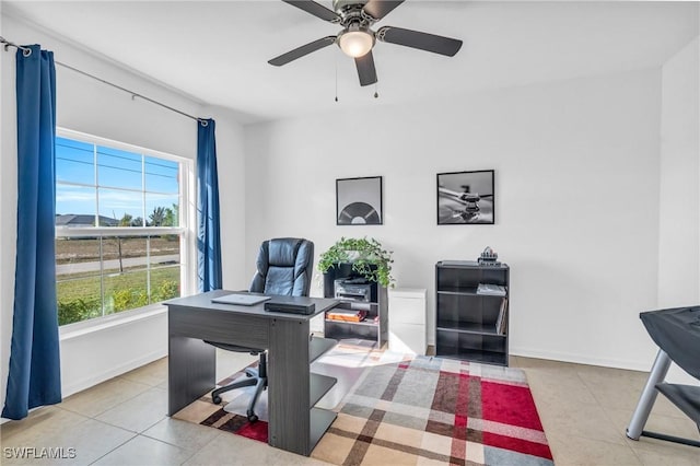 tiled office space with ceiling fan