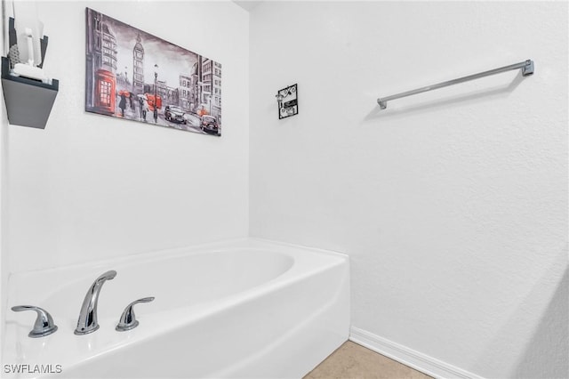 bathroom with a washtub