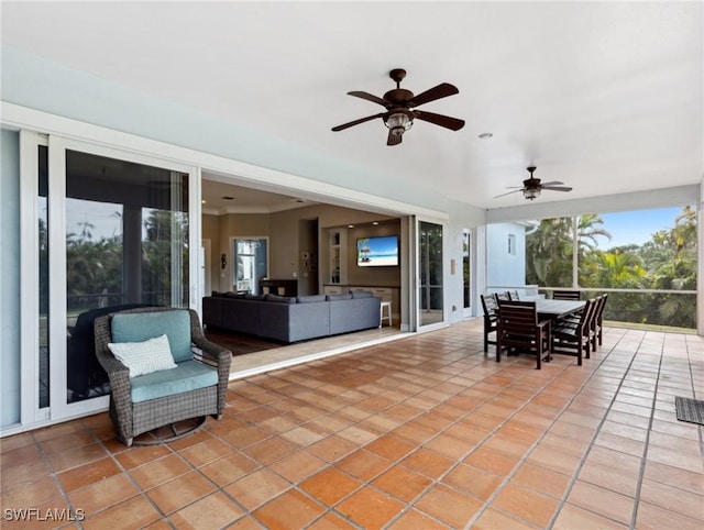 view of patio featuring ceiling fan and outdoor lounge area