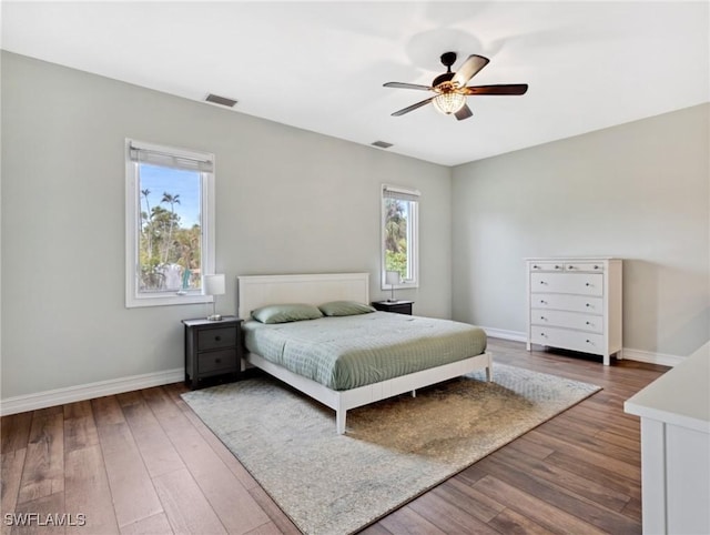 bedroom featuring ceiling fan and wood-type flooring