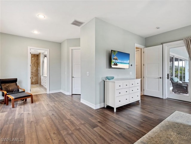 living room featuring dark wood-type flooring