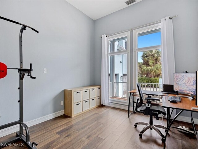 office with hardwood / wood-style floors