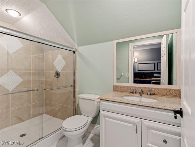 bathroom featuring walk in shower, vanity, and toilet