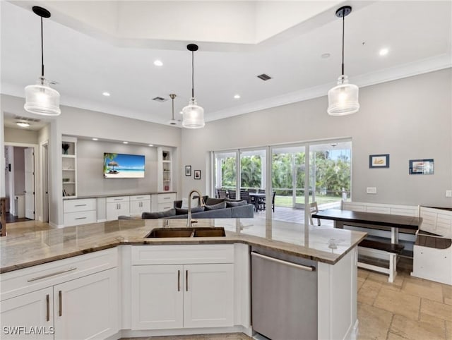 kitchen featuring white cabinetry, sink, dishwasher, and decorative light fixtures