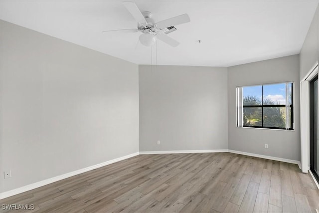 unfurnished room with ceiling fan and light hardwood / wood-style flooring