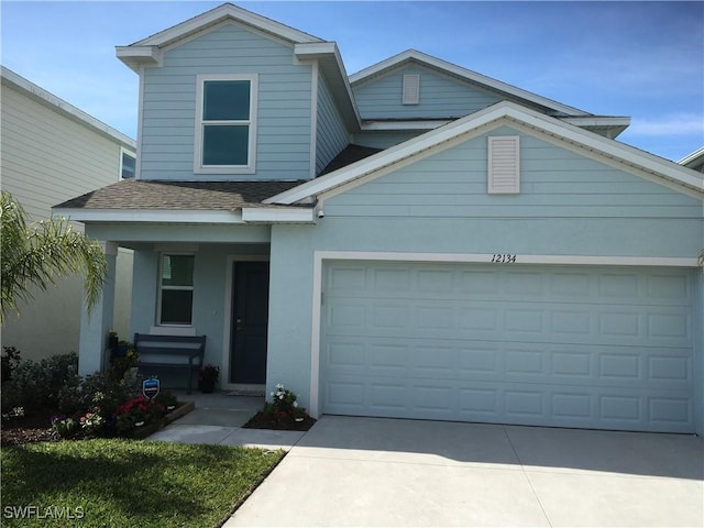 view of front of property featuring a garage