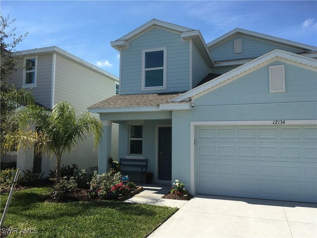 view of front property with a garage