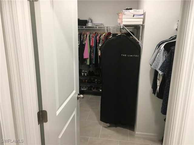 walk in closet featuring light tile patterned floors