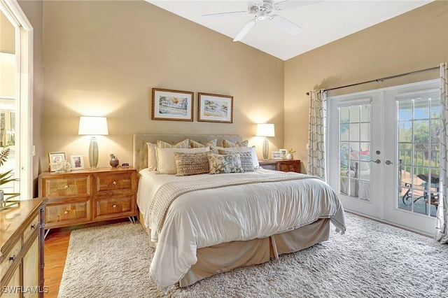 bedroom with ceiling fan, light hardwood / wood-style flooring, access to outside, and french doors